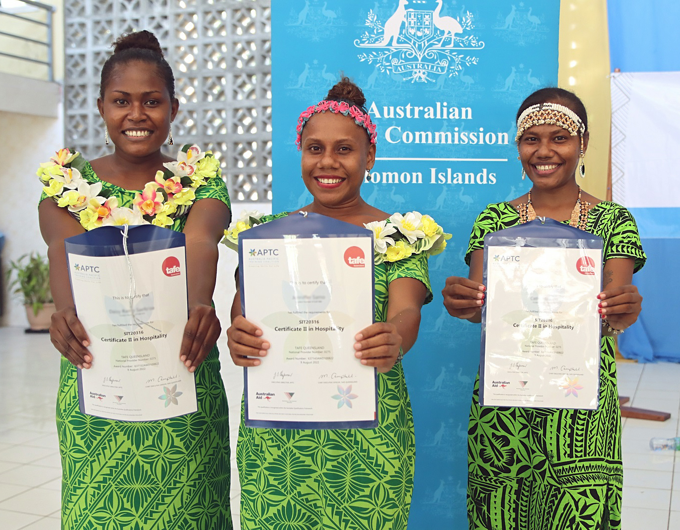 Graduates after receiving their certificates at the APTC Solomon Islands Graduation ceremony