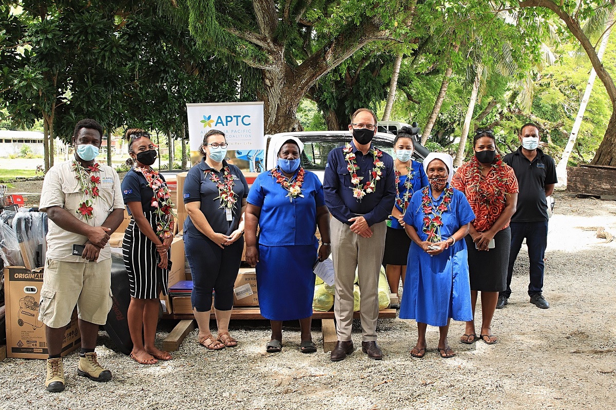 Guests at the handing over ceremony of a new vehicle, tools and resources to Divit Rural Training Centre